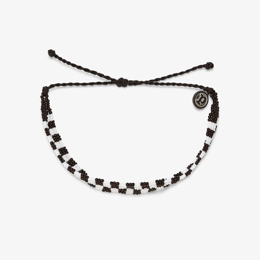 Woven seed bead checkerboard bracelet in Black/White by Pura Vida — product view