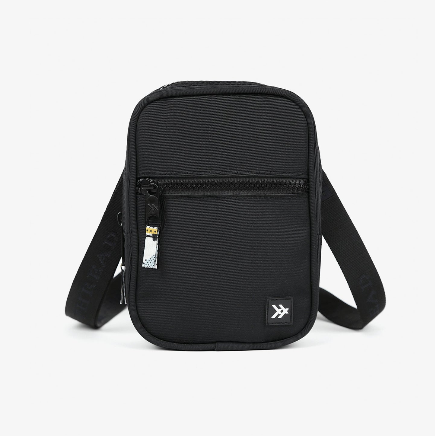 Black crossbody bag in Black by Thread Wallets — product view 1