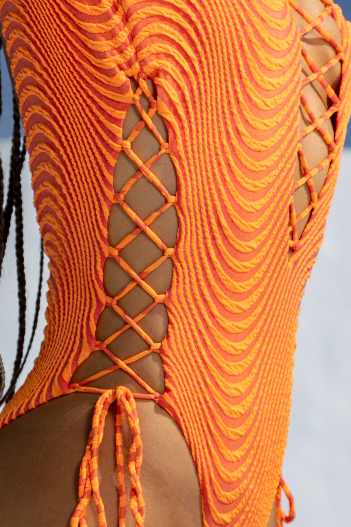 Open side one-piece bodysuit by Luli Fama — color variant alternate side view