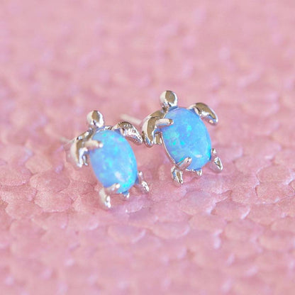 Opal sea turtle earrings by Pura Vida — front view