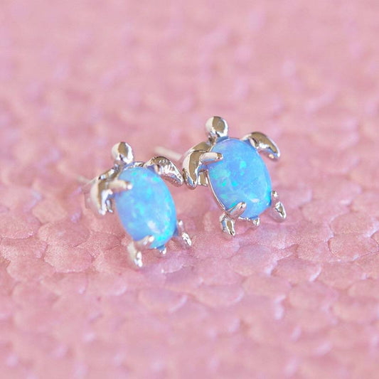 Opal sea turtle earrings by Pura Vida — front view